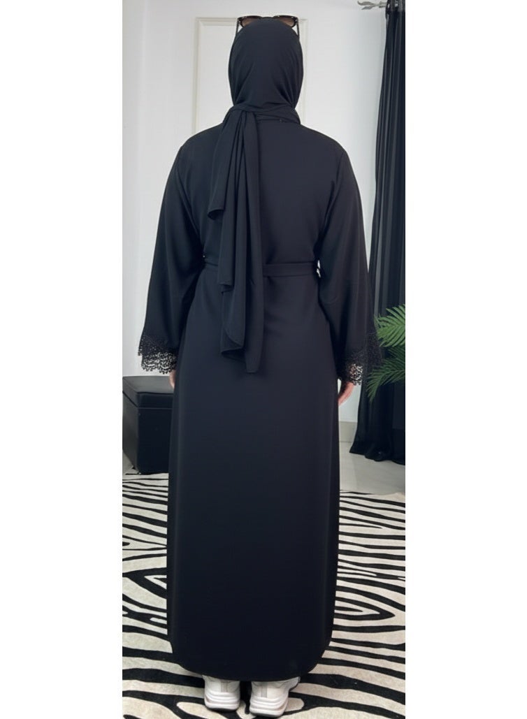 Elegant black women's abaya with luxurious lace sleeves, featuring a modern, wide design and sophisticated look perfect for special occasions and everyday outings. Add a touch of glamour and elegance to your look. Code 4040 - Image 2
